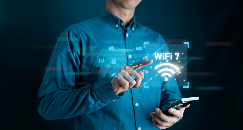 Male hands using Cellphone with Glowing Digital Brain Hologram